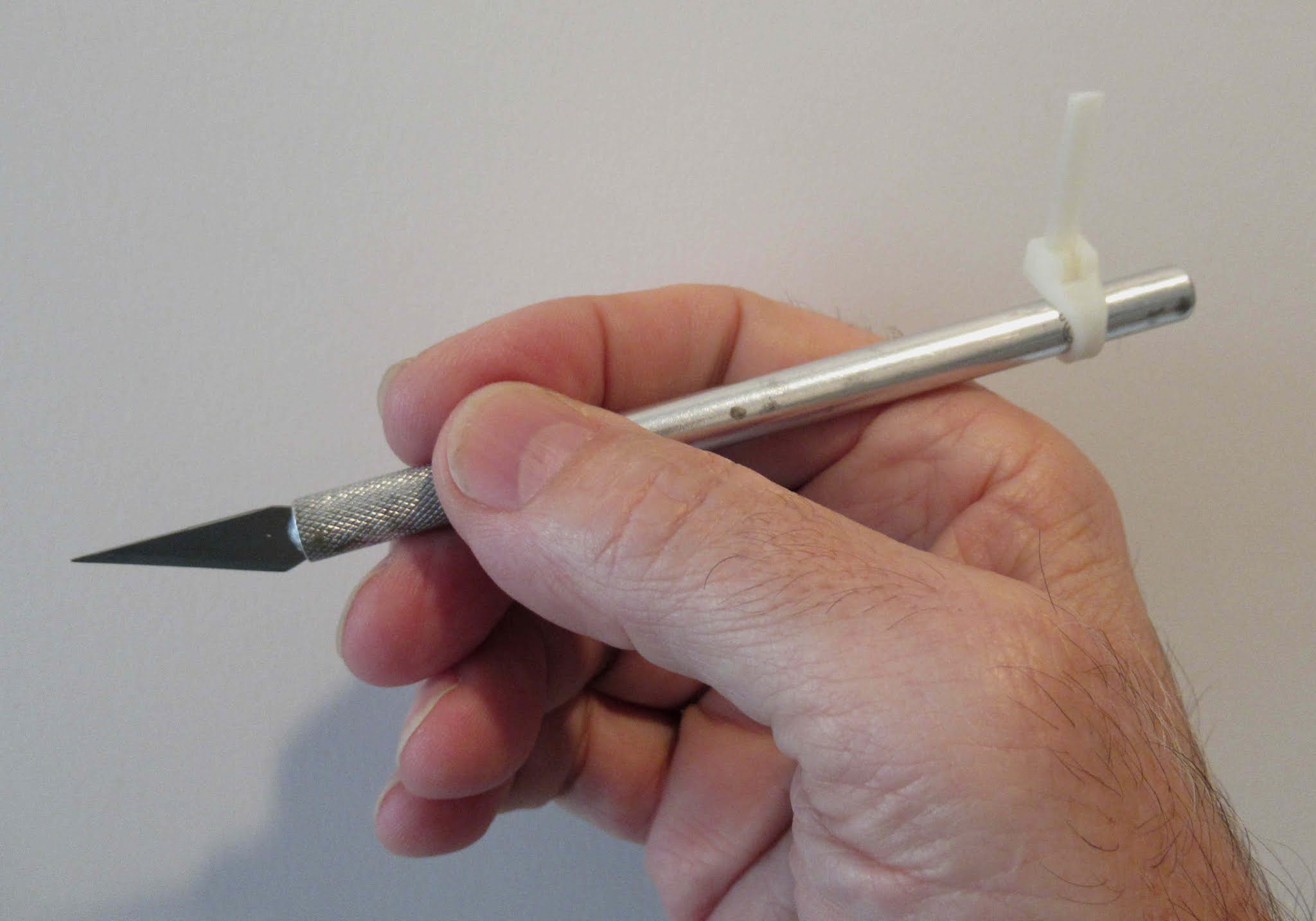Model Rocket Building X Acto Knife Rolling Off The Table TIP
